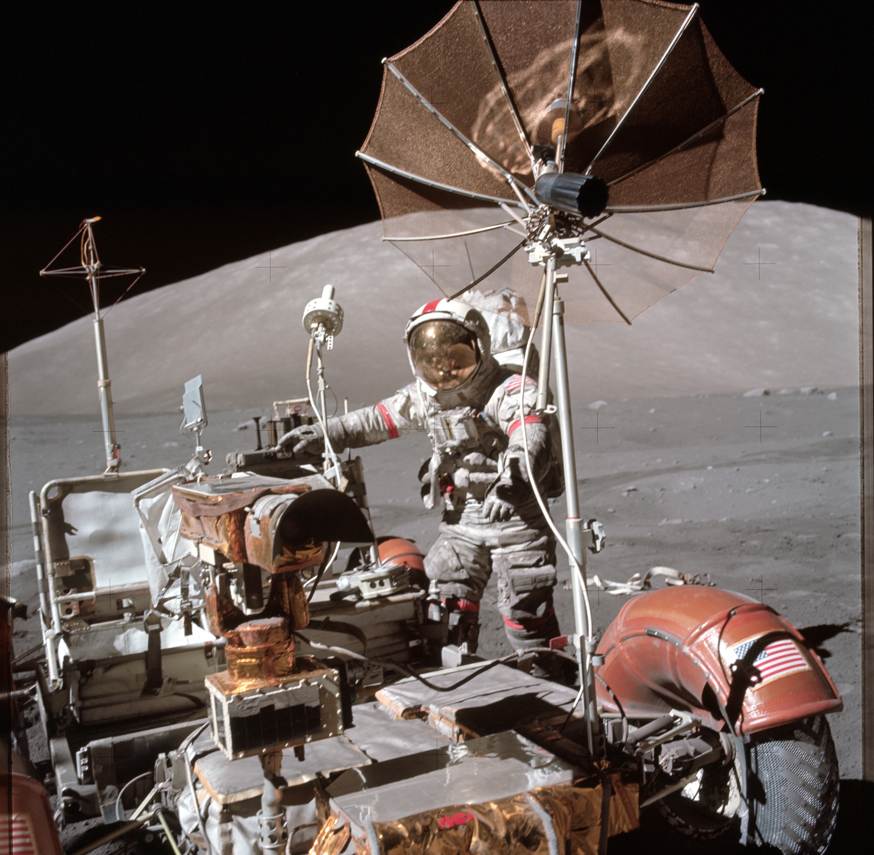 Astronaut and moon rover on the moon during the last moon mission
